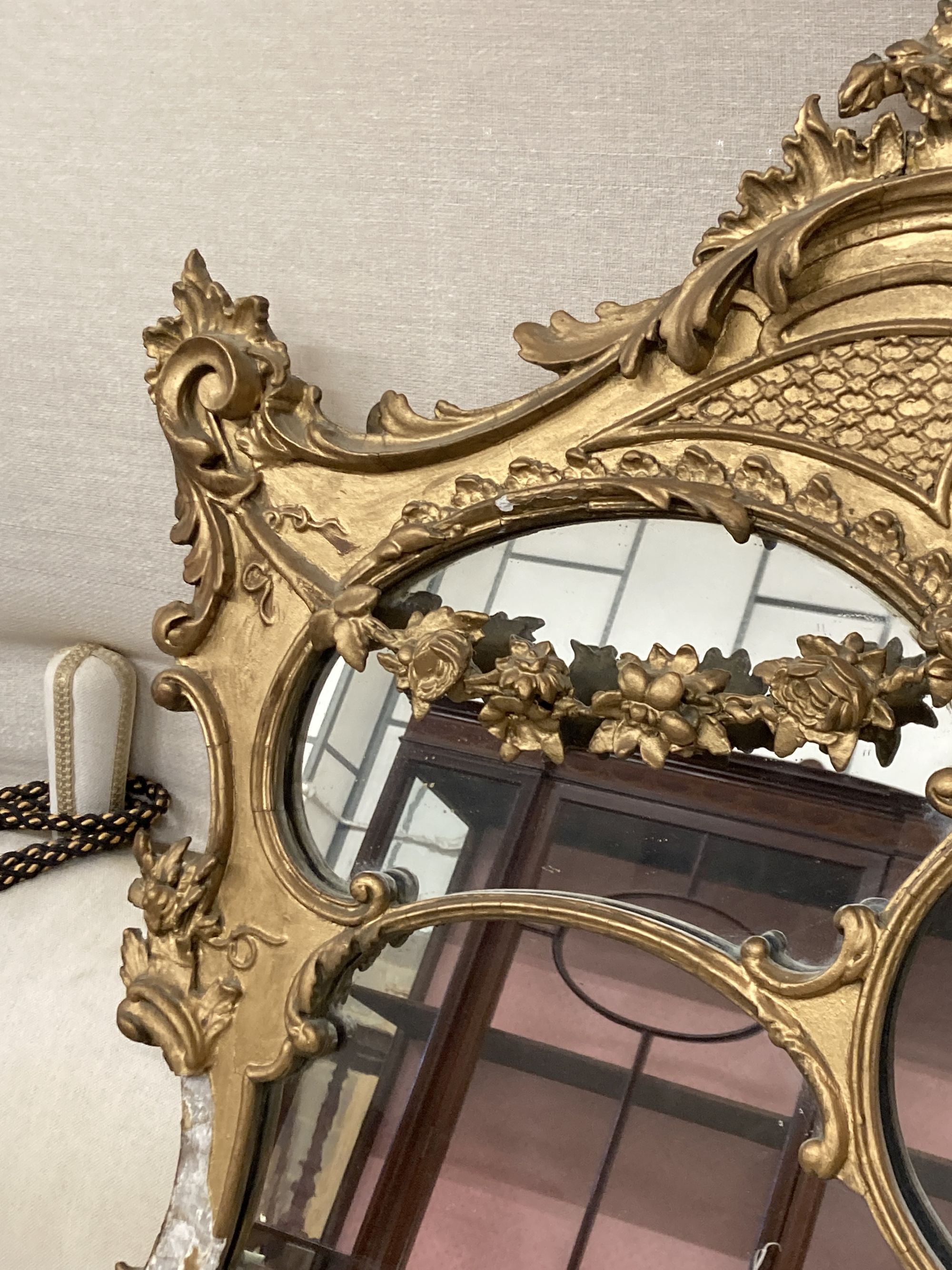 A late Victorian giltwood and gesso overmantel mirror, width 108cm, height 115cm